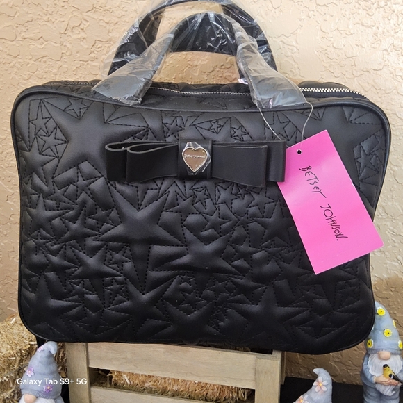 Betsey Johnson Handbags - Betsey Johnson Black Quilted Star Cosmetic Bag